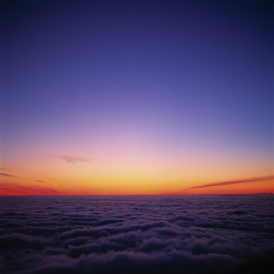 Red And Blue Sky Above Clouds At Sunset by Throstur Thordarson Pricing Limited Edition Print image