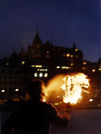 A Fire Eater In Stockholm At Night by Jens Olof Lasthein Pricing Limited Edition Print image