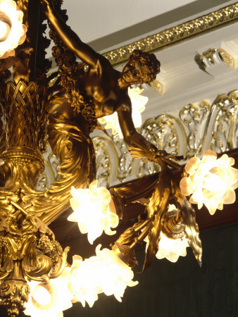 St Regis Hotel, New York, Usa, Detail Of A Figure On A Chandelier by Jeremy Cockayne Pricing Limited Edition Print image