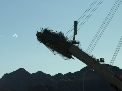 Silhouette Of The New Hoover Dam Bridge Under Construction, Nevada Side by Richard Williamson Pricing Limited Edition Print image