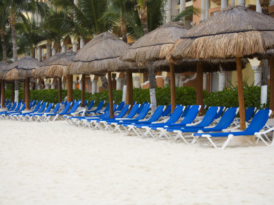 Row Of Lounging Chairs, Playa De Carmen, Quintana Roo, Mexico by Julie Eggers Pricing Limited Edition Print image