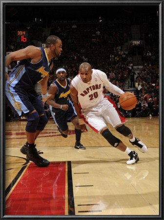 Denver Nuggets V Toronto Raptors: Leandro Barbosa And Shelden Williams by Ron Turenne Pricing Limited Edition Print image