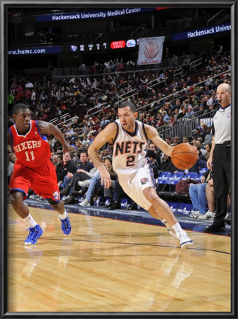Philadelphia 76Ers V New Jersey Nets: Jordan Farmar And Jrue Holiday by David Dow Pricing Limited Edition Print image