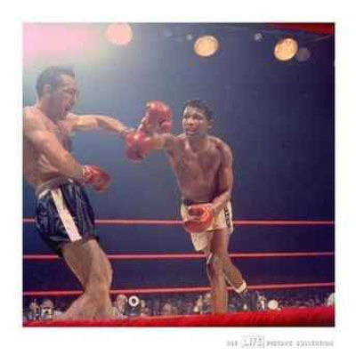 Life® - Sugar Ray Fighting Carmen Basilio In World Middleweight Boxing Match, 1958 by George Silk Pricing Limited Edition Print image