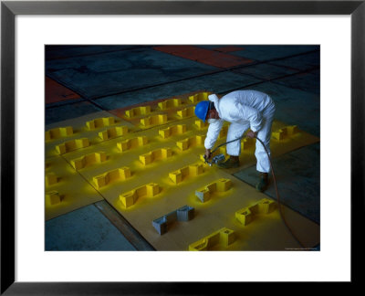 Man Sprays Yellow Paint On Parts, Nm by Kelly Gatlin Pricing Limited Edition Print image