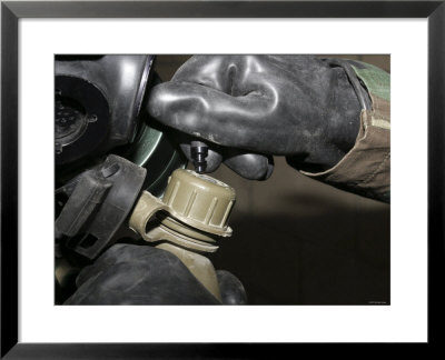 A Marine Inserts A Drinking Tube Into His Canteen Inside The Cs, Or Tear Gas, Filled Gas Chamber by Stocktrek Images Pricing Limited Edition Print image