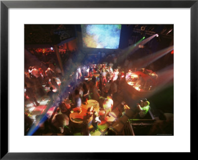 Young People Dance In The Hollywood Night Club, At The Stalin Cinema, Tallinn, Estonia by Yadid Levy Pricing Limited Edition Print image