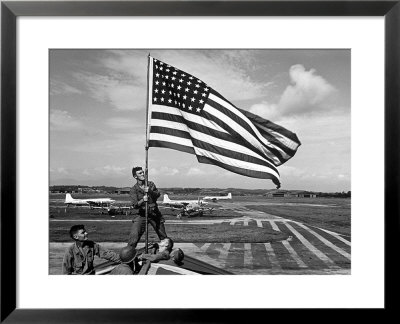 Soldiers Raising American Flag At Atsugi Airbase As First American Occupation Forces Arrive by Carl Mydans Pricing Limited Edition Print image