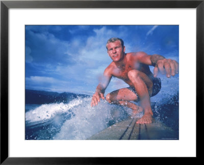 Surfer Nick Beck Riding His Surfboard In The Waters Off Hawaii by George Silk Pricing Limited Edition Print image