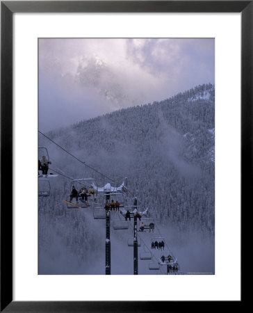 Chair Lift Filled With Skiers And Snowboarders, Washington State, Usa by Aaron Mccoy Pricing Limited Edition Print image