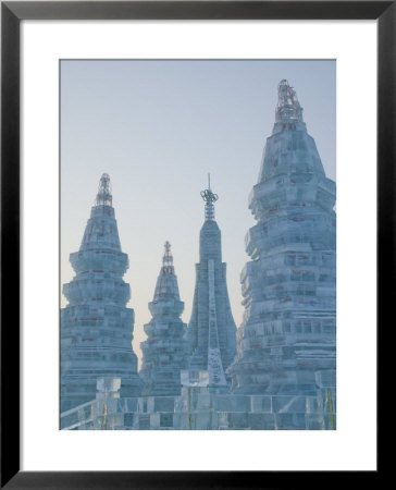 Ice Towers At Sunset, Haerbin Ice And Snow World Festival, Harbin, Heilongjiang, China by Walter Bibikow Pricing Limited Edition Print image