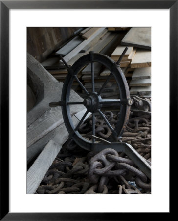 Old Ship's Wheel, Chains And Wood Planks Against A Cedar Wall, Mystic, Connecticut by Todd Gipstein Pricing Limited Edition Print image