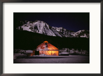 A Warm Glow Comes From The Dutchers Tent At Night by Jim And Jamie Dutcher Pricing Limited Edition Print image
