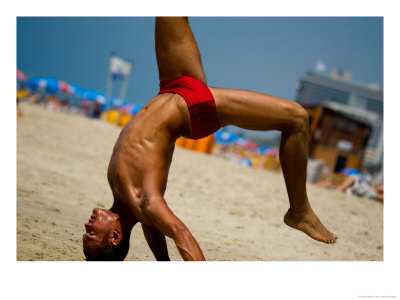 Young Man Doing Capoiera On Beach, Tel Aviv, Israel by Stephane Victor Pricing Limited Edition Print image