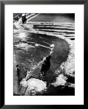 Maintenance Men Removing Ice After Hockey Game In Madison Square Garden by Gjon Mili Pricing Limited Edition Print image