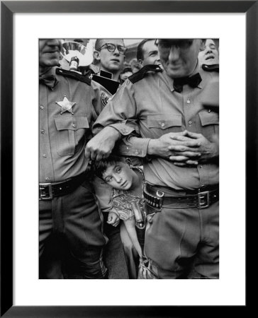Little Boy Peeking Between Police Men To See Dwight D. Eisenhower Give His Speech by Ralph Morse Pricing Limited Edition Print image