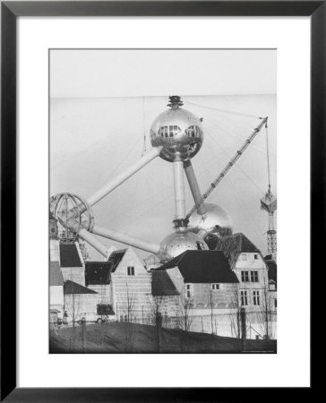 Atomium Towering Over Belgian Folklore Exhibit At Brussels World's Fair by Michael Rougier Pricing Limited Edition Print image