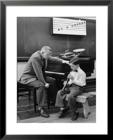 Child Playing Various Musical Instruments by Nina Leen Pricing Limited Edition Print image