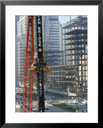 Workers Service Crane Across Street From National Bank Building Under Construction On Park Ave by Dmitri Kessel Pricing Limited Edition Print image