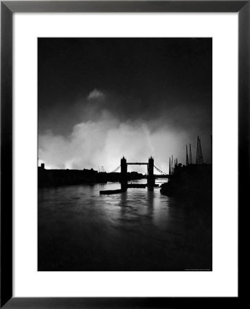 Tower Bridge Against Fires Burning On London's Docks, Ignited During German Air Raid Attack On City by William Vandivert Pricing Limited Edition Print image