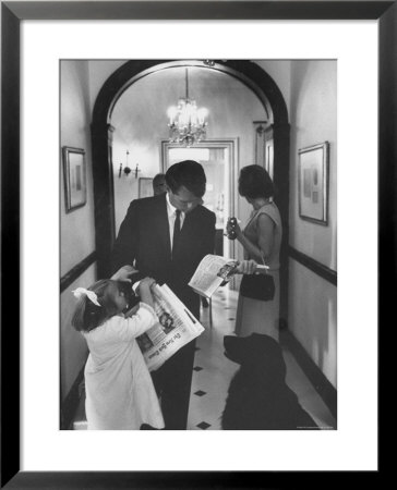 Us Attorney General Bobby Kennedy Browsing Copy Of The Ny Times With Daughter And Wife by George Silk Pricing Limited Edition Print image