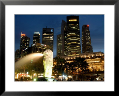 Merlion Fountain With Statue Of Half Lion And Fish, With City Buildings Beyond, Southeast Asia by Richard Nebesky Pricing Limited Edition Print image