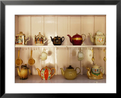Display Of Assorted Tea Pots, Spoons And Strainers At Tea Pot Restaurant by Felix Hug Pricing Limited Edition Print image