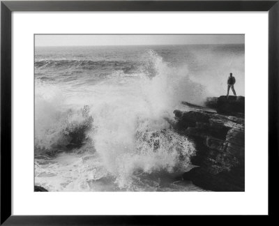 Oceanographer Willard Bascom Standing On A Rock While Observing The Crashing Surf by Bill Ray Pricing Limited Edition Print image