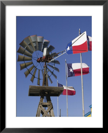 Old Water Pump And Texas State Flags, Amarillo, Texas by Walter Bibikow Pricing Limited Edition Print image