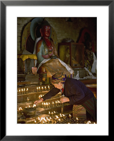 Old Woman Lighting Butter Lamps In A Small Temple On The North Side Of Boudha Or Bodhnath Stupa by Don Smith Pricing Limited Edition Print image