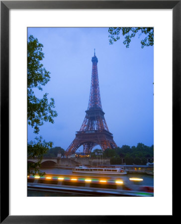 Early Evening View Of Eiffel Tower And Tour Boats On The Seine River, Paris, France by Jim Zuckerman Pricing Limited Edition Print image