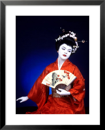 Close-Up Of Geisha Girl In Blue With Fan, Kyoto, Japan by Bill Bachmann Pricing Limited Edition Print image