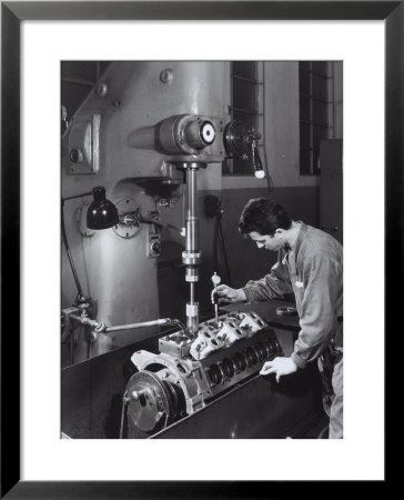 Worker Operating A Machine In The Ferrari Factory by A. Villani Pricing Limited Edition Print image