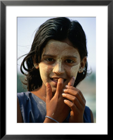 Portrait Of Girl In Traditional Face Paint, Bago, Myanmar (Burma) by Bernard Napthine Pricing Limited Edition Print image