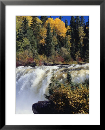 The Grass River Thunders Over Pisew Falls In Manitoba by Raymond Gehman Pricing Limited Edition Print image