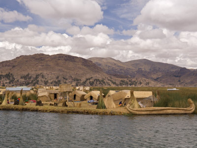Floating Artificial Islands Made Of Reeds, Islas De Los Uros, Lake Titicaca, Peru by Dennis Kirkland Pricing Limited Edition Print image