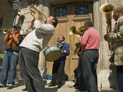 Vagabontu, A Traveling Romani Brass Band, On A Market Day In Provence, France by Stephen Sharnoff Pricing Limited Edition Print image