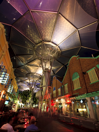 Night Time At Clarke Quay With The Ceilings Colourfully Illuminated, Singapore by Kimberley Coole Pricing Limited Edition Print image