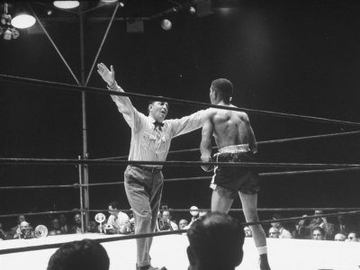 Referee Stopping Fight Between Boxer Randy Turpin And Sugar Ray Robinson by George Silk Pricing Limited Edition Print image