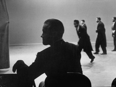 Silhouette Of Entertainer Bob Hope's Profile, With Dancers Rehearsing On The Colgate Comedy Hour by Ed Clark Pricing Limited Edition Print image
