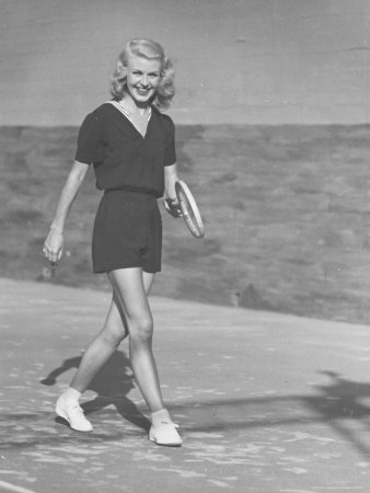 Ginger Rogers Dressed In Sailor Style Tennis Outfit While Playing Tennis Game by Peter Stackpole Pricing Limited Edition Print image