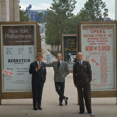 Leonard Bernstein Standing Outside By Posters For Philharmonic, Nyc Ballet by Michael Rougier Pricing Limited Edition Print image
