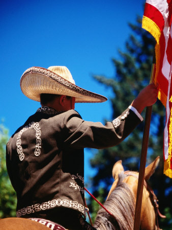 Man Riding A Horse In The Cinco De Mayo Parade For The Mexican Community, Calistoga, Usa by Jerry Alexander Pricing Limited Edition Print image