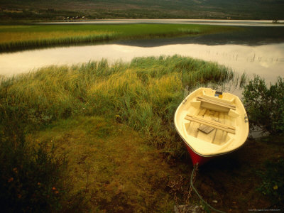 Boat Beside Lake At Sunset, Sor-Trondelag, Norway by Jon Davison Pricing Limited Edition Print image