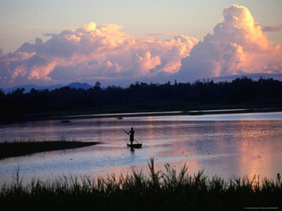 Sepik River, Maliwai, Upper Sepik, At Sunset, East Sepik, Papua New Guinea by John Borthwick Pricing Limited Edition Print image