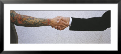 Close-Up Of Two Men Shaking Hands, Germany by Panoramic Images Pricing Limited Edition Print image
