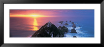Sunset, Nugget Point Lighthouse, South Island, New Zealand by Panoramic Images Pricing Limited Edition Print image