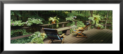 Chairs On The Deck Porch Of A House by Panoramic Images Pricing Limited Edition Print image