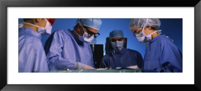 Four Surgeons In An Operating Room, Hospital by Panoramic Images Pricing Limited Edition Print image