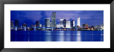 Panoramic View Of An Urban Skyline At Night, Miami, Florida, Usa by Paula Scaletta Pricing Limited Edition Print image